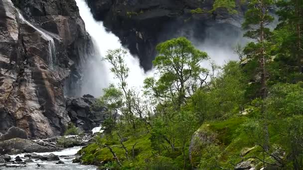 Waterfall in mountains of Norway in rainy weather. — Stock Video