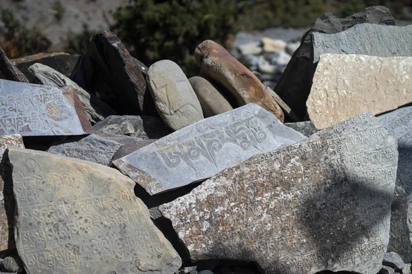 Stone with tibetian mantras Tibet sanscrit — Stock Photo, Image