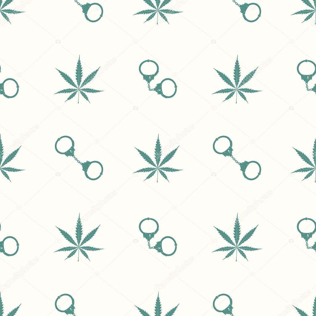 seamless pattern with cannabis leaves and handcuffs  