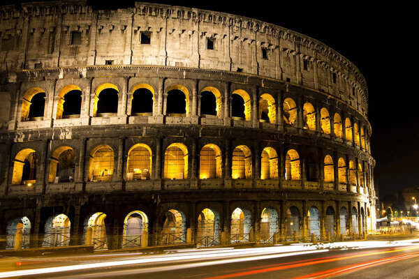 Night photograph of the Colosseum in Rome, Italy.