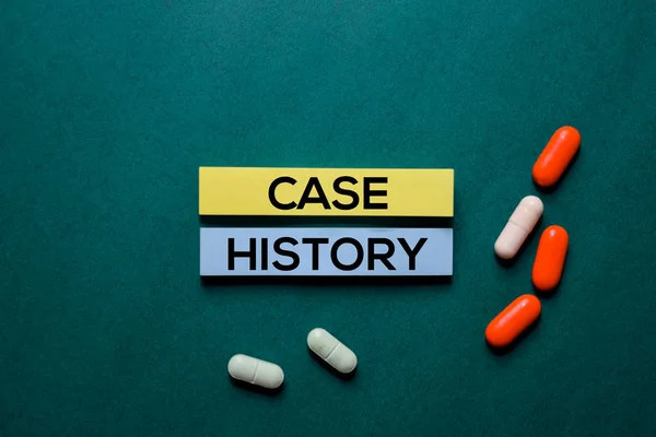 Case History text on sticky notes. Office desk background. Medical or Healthcare concept