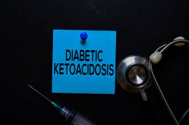 Diabetic Ketoacidosis text on sticky notes. Top view isolated on black background. Healthcare/Medical concept clipart