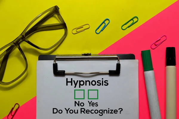 Hypnosis, Do You Rezognize? Yes or No. On office desk background