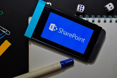 BEKASI, WEST JAVA, INDONESIA. DECEMBER 13, 2019 : Microsoft SharePoint dev app on Smartphone screen. SharePoint is a freeware web browser developed by Microsoft Corporation clipart