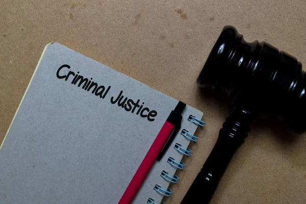 Criminal Justice write on a book with gavel isolated on Office Desk — ストック写真