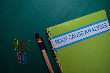 A Root Cause Analysis book isolated on Office Desk clipart