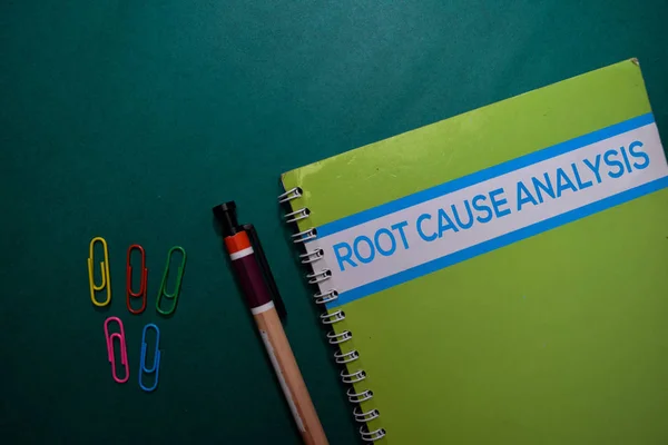 A Root Cause Analysis book isolated on Office Desk