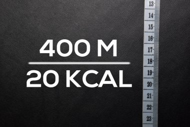 Metin 400 M - Siyah masaya 200 Kcal yaz.