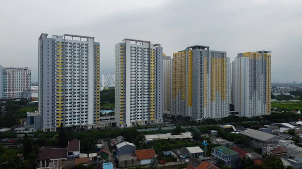 Bekasi, West Java, Indonesia - January 21 2020: Aerial landscape of modern apartment building in Bekasi central business district from a drone. — 스톡 사진