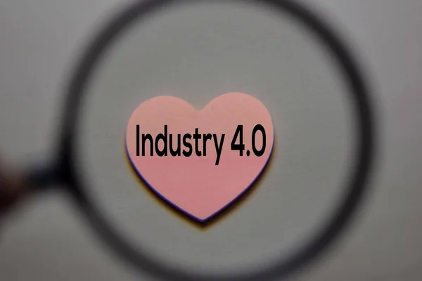 Industry 4.0 write on a sticky note isolated on office desk. — Stock Photo, Image