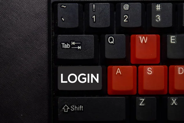 Login isolated on laptop keyboard background