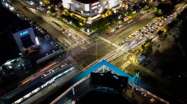 Jakarta. Indonesia. March 8 2020: light trails on motorway highway at night, long exposure abstract urban background at Bekasi