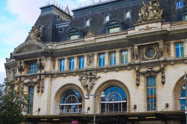 Paris, France. January 18. 2020.Historic building dating back to 1900 by architect Marius ToudoireView of the faade of Lyon station in the French capital. clipart