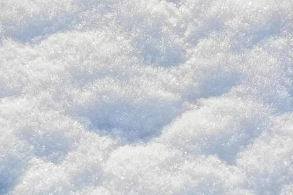 Cristalli bianchi di neve. Struttura di sfondo — Foto Stock