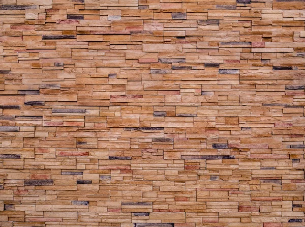 Escenografía decorativa de piedra marrón. Cortar textura de pared de piedra . — Foto de Stock