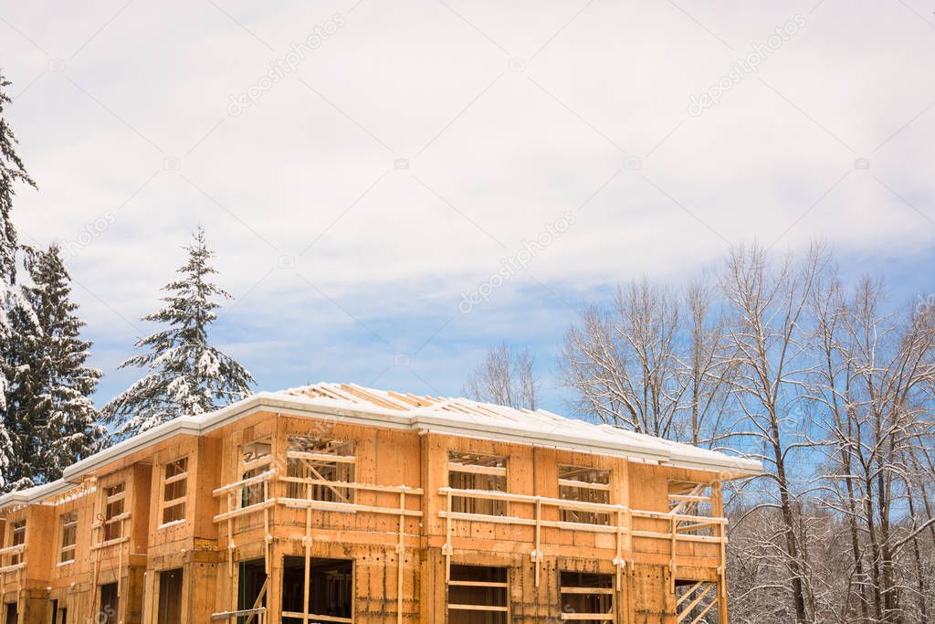 Townhome complex under construction on winter time.
