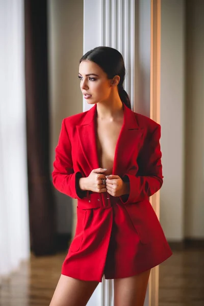 Gorgeous woman brunette wears red jacket — Stock Photo, Image