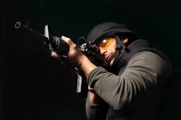 Cop shoots a rifle shooting range