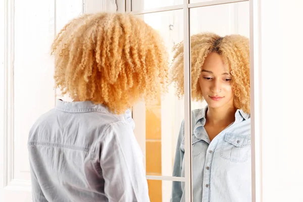 Sad woman  in the mirror — Stock Photo, Image