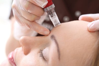 Needle mesotherapy treatment aesthetic execution in the beauty salon clipart