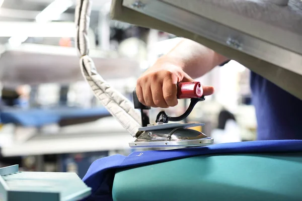 Ironing. Clothing industry. — Stock Photo, Image