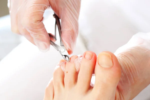 Pedicure, nagel knippen. — Stockfoto