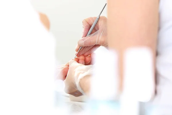 Pedicure, cutting skins. — Stock Photo, Image