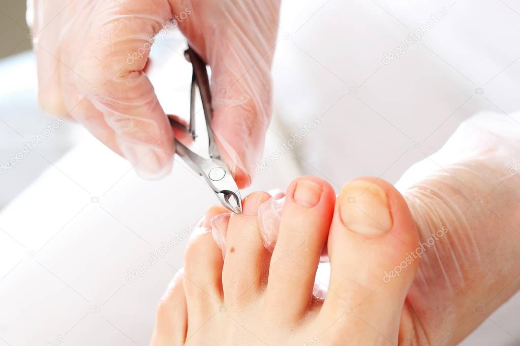 Pedicure, nail clipping.