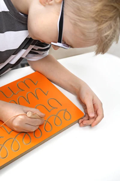 Calligraphy Smiling Boy Practicing Writing Letters — Stock Photo, Image