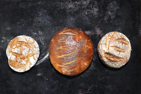 Homemade sourdough bread. A composition of natural, organic bakery pastries.