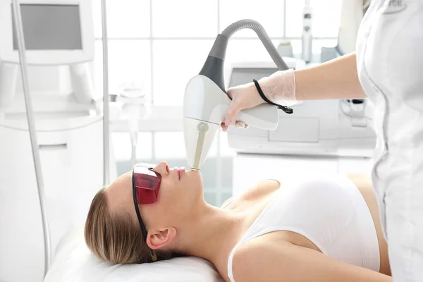 Laser hair removal. Woman on facial photodepilation — Stock Photo, Image