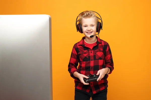 Child Boy Plays Video Games Headphones Young Handsome Smiling Caucasian — Stock Photo, Image