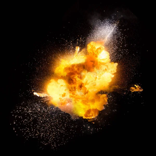 Destello de explosión brillante en un fondo negro. explosión de fuego Imagen De Stock