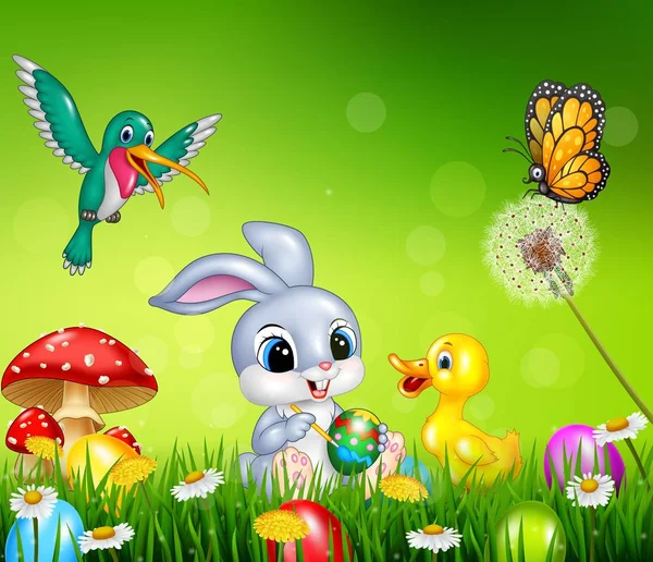 Lapin de Pâques avec oeufs de Pâques décorés dans un champ — Image vectorielle