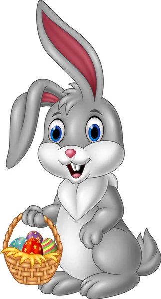 Cartoon rabbit holding an easter basket — Stock Vector