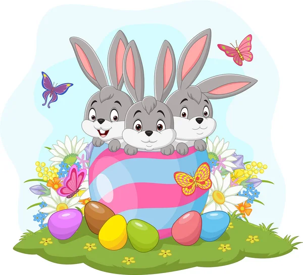 Vektorová Ilustrace Tří Velikonočních Zajíčků Velikonočním Vejci — Stockový vektor