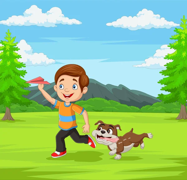 公園でペットと一緒に紙飛行機を遊んで幸せな少年のベクトルイラスト — ストックベクタ