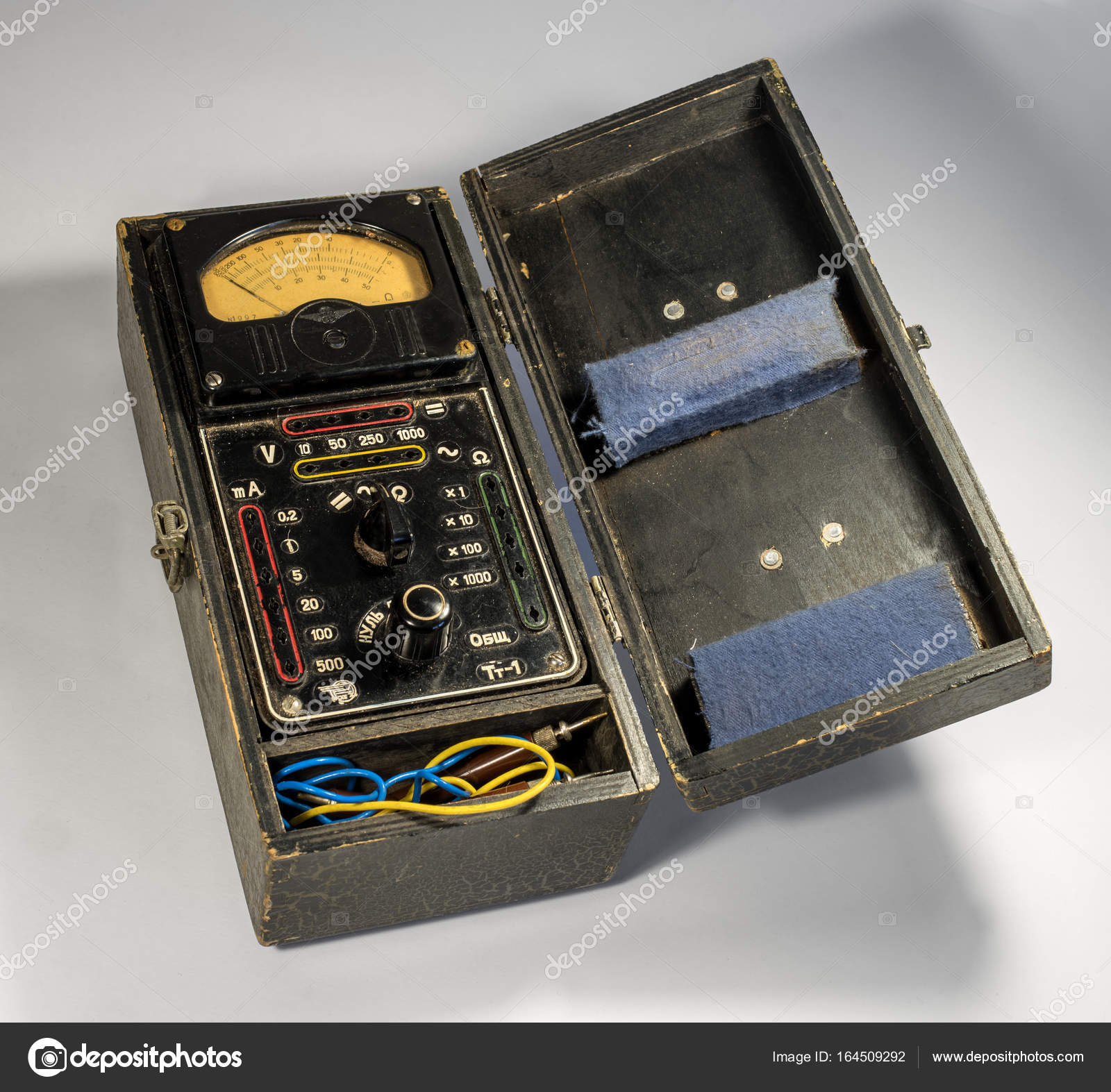 Vintage analog multimeter in wooden case. — Stock Photo © Oktober64