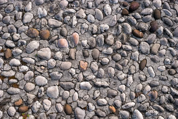 石のテクスチャまたはシームレスな背景の石畳の道. — ストック写真