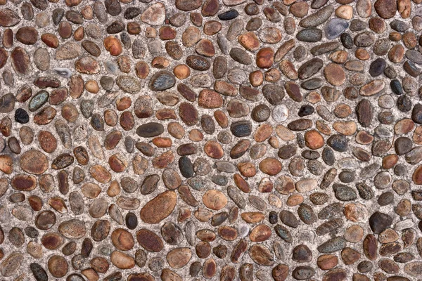 Drogi z kostki brukowej kamienia tekstura lub bezszwowe tło. — Zdjęcie stockowe