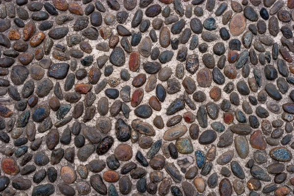 石畳から石のテクスチャまたはシームレスな背景への道. — ストック写真