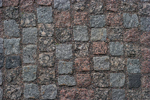 Fondo abstracto del antiguo pavimento de adoquines. Primer plano —  Fotos de Stock