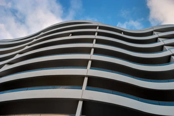 Wall of a modern building with curved balconies. Abstract picture for background — Stock Photo, Image