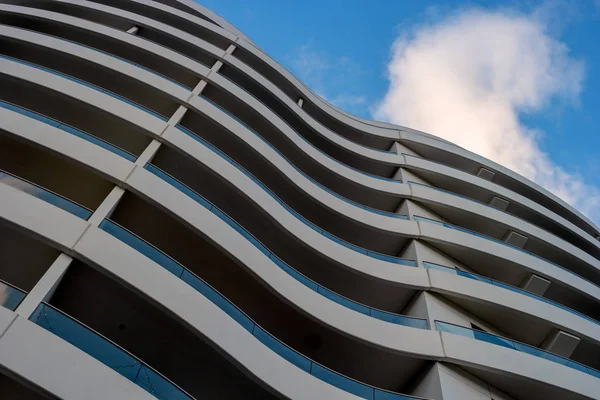 stock image Wall of a modern building with curved balconies. Abstract picture for background