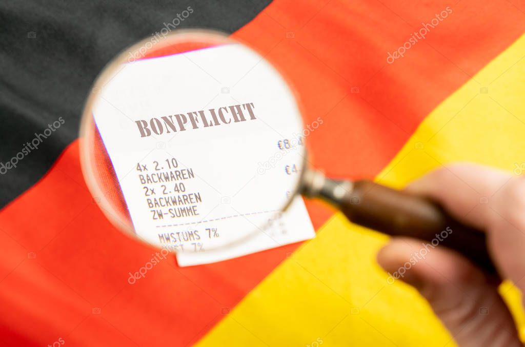 receipt with the German inscription receipt obligation on a German flag