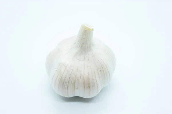 Garlic head located on a white background — Stock Photo, Image