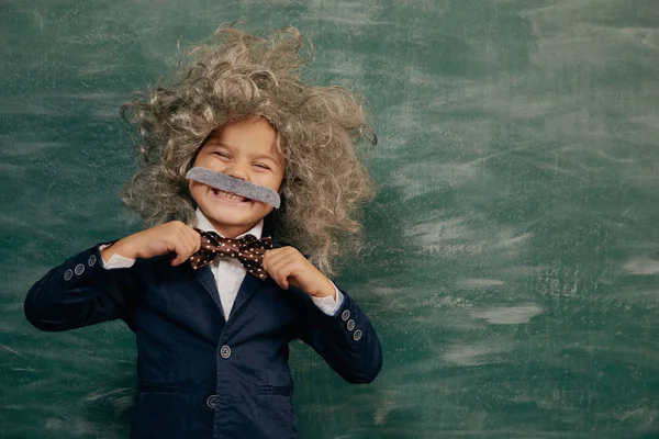 Cheerful Smiling Little Kid Boy Green Chalkboard Looking Camera Little — Stock Photo, Image