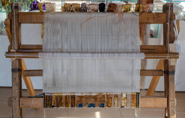 Old traditional style carpet, rug loom. Weaving