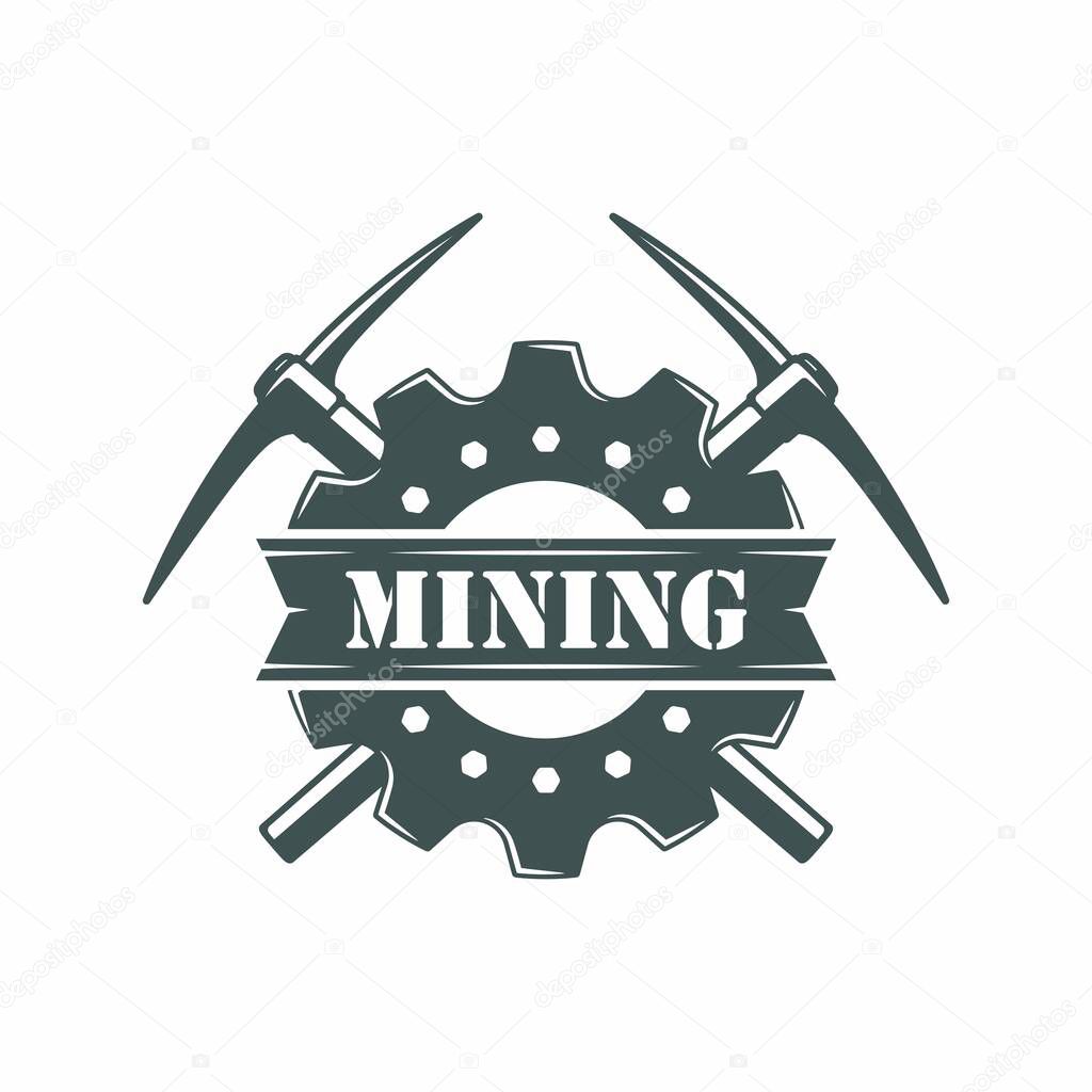 Black and white illustration of crossed pickaxes, gear, text on a white background. Vector illustration on the theme of gold and coal mining. Mineral mining company logo.