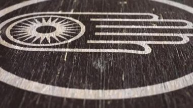 Hand With Wheel - Jain Symbol On Wodden Texture. Ideal For Your Jainism / Religion Related Projects. High Quality Seamless Animation. 1080p, 60fps